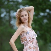 Skinny and pale girl naked outside on a park bench