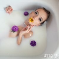 Alisabelle taking a milky bath