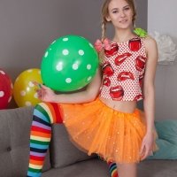 Slim and petite girl Lili naked in the living room